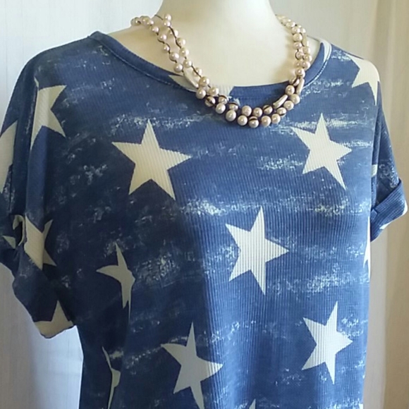 Tops - New.  Star print Top.